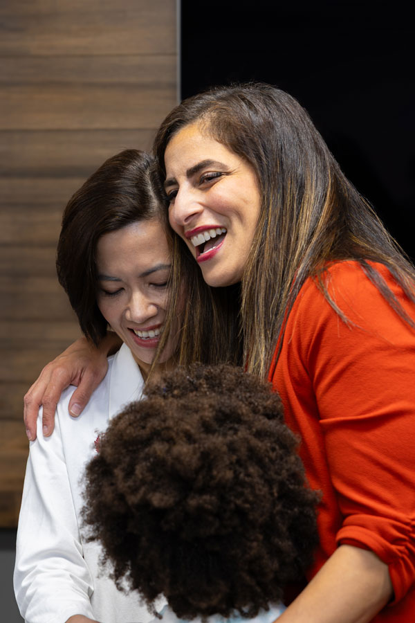 Dr. Chi Viet and Pauline Deeb share a moment during a Healing Hands Award recognition event hosted by LLUSD.