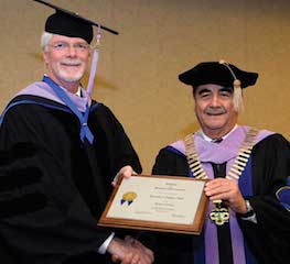 ADI President Ramon Baez congratulates Dr. Dailey on his Honorary Fellowship.