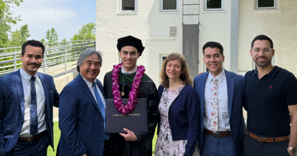 chan family photo at sons graduation from LLU