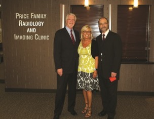 Drs. Dailey, Price and Abramovitch stand at  the patient check-in windows of the  Price Family Radiology and Imaging Clinic.