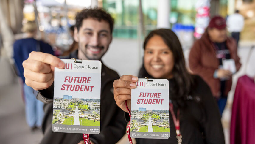 future students holding Open House badges