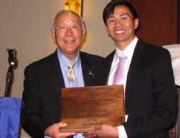 Dr. Terry Tanaka congratulates Michael Siy