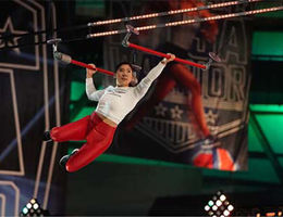 Sarah Chang swings from obstacle course bars